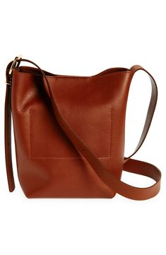 Madewell's newest leather bag collection is cool, modern and quietly luxe. With a magnetic closure and interior pocket, the mini bucket tote is perfectly sized to hold your phone, wallet, keys and more—plus, it has a shoulder strap and adjustable crossbody strap. It's so good, it's essential. Structured silhouette with flat base for stability Leather Imported Mini Bucket Bag, Bucket Tote, Mini Bucket Bags, Mini Bucket, Bag Collection, Phone Wallet, Magnetic Closure, Crossbody Strap, Bucket Bag