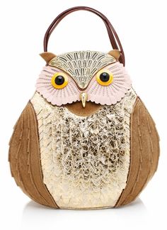 an owl purse is shown on a white background