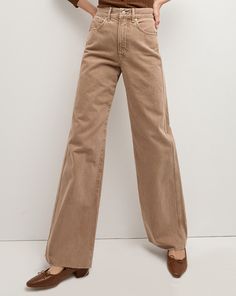 The Taylor Wide-Leg Jean you know and love—now in light brown. Made in LA from non-stretch Japanese denim, this high-rise, wide-leg jean silhouette is a VB favorite. The versatile length works well with flats and heels alike.100% CottonPremium Japanese denimMade in USATurn inside out and machine wash cold. Hang to dry.Style #J24089501040TS Layering Jacket, Bearded Lady, Brown Oxfords, Plain White Tee, Japanese Denim, Veronica Beard, Engineered Garments, Wide Leg Denim, Black Cardigan