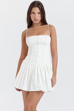 Celebrate the warm and sunny days with the Vacay Sensibility White Pleated Mini Dress! This is ultra feminine dress has the prettiest details like the pin tuck bodice hook and eye detailing to the front and voluminous pleated skirt for pretty movement - highlighting great legs. Hidden back zipper/clasp. 100% Polyester. Lined. Runs true to size. Hand Wash Cold. Do Not Bleach. Line Dry. Iron Low Heat. Origin China. Size Chart (Unit cm) Size Bust Waist Hip Length XS 76-86 56-64 80-90 61 S 80-90 60- White A Line Dress, Holiday Dresses Women, Dress Collar, Corset Mini Dress, Estilo Preppy, Pleated Mini Dress, Style Preppy, Bodycon Dress Parties, American People