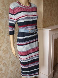 "Striped sweater dress in navy\\grey\\blue and red .  This lovely dress is ribbed with elbow length sleeves. It is very flattering when on and super comfortable. Bust flat, pit to pit;  20\" Waist flat;  16\" Inside sleeve;  7\" Length;  45\" Made in France synthetic" Winter Midi-length Sweater Dress, Winter Ribbed Knee-length Midi Dress, Winter Knit Bodycon Midi Dress, Knitted Crew Neck Sweater Dress For Spring, Winter Knit Fitted Midi Dress, Knit Dress With Ribbed Neckline For Fall, Fall Knit Dress With Ribbed Neckline, Winter Knitted Dress With Crew Neck, Fall Non-stretch Midi Sweater Dress