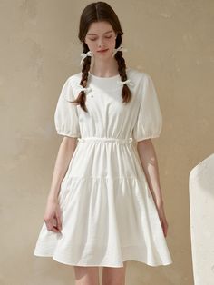 Editor's Notes The dress has puffs on shoulders and sleeves for a full, voluminous silhouette.- String at the waist- Pleated dress- Zipper at the backMeasurements(in.)ONE SIZE- Shoulder: 14.17 in.- Chest: 17.72 in.- Armhole: 8.86 in.- Sleeve: 10.24 in.- Waist: 16.73 in. *Model info: Arina - Height 5' 9'', Bust 14.96 in., Waist 11.81 in., Hips 17.32 in.Composition & Care- 50% Rayon, 36% Polyester, 14% Nylon- Dry cleaning recommended- Be careful of drying for special fabrics (ve White Dress With Puff Sleeves And Voluminous Skirt, Elegant Puff Sleeve Dress With Bubble Hem, Voluminous Puff Sleeve Midi Dress With Ruffles, Voluminous Puff Sleeve Dress With Ruffles, Puff Sleeve Voluminous Midi Dress For Daywear, Voluminous Puff Sleeve Midi Dress For Daywear, White Puff Sleeve Dress With Pleated Details, Feminine Daywear Dress With Puff Sleeves, White Dress With Pleated Puff Sleeves