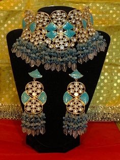 Product code- 98 Beautiful choker work Firozi meenakari and kachidakari work. watercolor blue and dark blue pearl beads Long earrings work push lock Beautiful Chokers, Handmade Chokers, Jewelry Lockets, Watercolor Blue, Star Chain, Blue Pearl, Matching Necklaces, Chain Pendants, Blue Stone