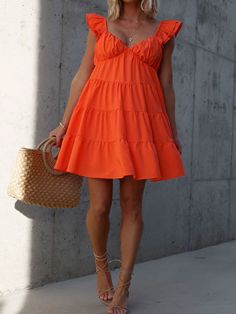 gender：Woman season：spring/summerMaterial ：Polyester Pattern type：printingSleeve length: sleevelessstyle ：commuting Top collar：v necklaundry guide ：Machine washable Trendy V-neck Mini Dress For Summer, Orange V-neck Sleeveless Summer Dress, Chic Orange Sleeveless Beach Dress, Orange Sundress For Summer Brunch, Orange Sleeveless Mini Dress For Summer, Orange V-neck Mini Dress For Summer, Summer Orange V-neck Mini Dress, Orange V-neck Dress For Vacation, Orange Sleeveless Summer Dress For Beach