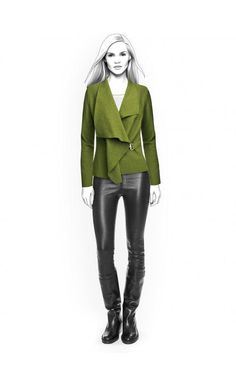 a woman is standing in front of a white background wearing black leather pants and a green jacket