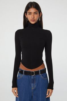 Crafted from our signature mid-weight stretch-rib, the Mads turtleneck top features tonal baby flat lock stitch, a fold-over turtleneck, and a curved hem. Oversized Trousers, The Line By K, Line By K, Lock Stitch, Turtleneck Outfit, Outfit Jewelry, Slip Skirts, Fitted Turtleneck, Turtleneck Top