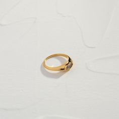 The 18K Gold Plated Cyclops Ring, as part of our Latest Collection, with this beautifully simple ring. The perfect accessory for any occasion, wether your going out or having a chilled night in, these are the perfect addition to any wardrobe. try pairing them with our other bestselling gold jewellery, to really elevate your accessory game. When you're not wearing this piece, tuck it away in your very own Milou jewellery box provided. Stainless Steel, plated with 18K Gold Zirconium Diamond Waterproof (Tarnish Resistant) Natural Linen Milou Jewellery Box Included For ring sizing, please see our Size Guide for details FREE WORLDWIDE SHIPPING Everyday Hoop Rings In Recycled Gold, Gold Plated Hoop Rings For Everyday, Everyday Gold Birthstone Ring With Vs Clarity, Modern Tarnish Resistant Crystal Open Ring, Modern Tarnish-resistant Open Crystal Ring, Gold Crystal Ring With Round Band For Everyday, Modern Hoop Rings Tarnish Resistant, Modern Gold Birthstone Ring With Round Band, Gold Crystal Promise Ring Minimalist Style