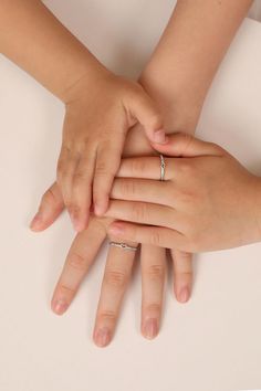 Simple minimalistic design with a tiny heart and diamonds, just perfect to match with any outfit and for everyday wear! Get this as a friendship/mother-daughter ring today! #Jewelry #Rings #Uniquedesign #Minimalistfashion #Daintyjewelry #Daintyring #Simplering #Silverring #Prettyring #Handmadejewelry #Stackablejewelry #Ringforwoman #Ringforher #Giftideas #Giftformom #Mothersday #Momjewelry #Momfashion #Motherdaughter #Momandbaby #Giftguide #Friendshiprings #Friendshipjewelry #Friendshipgift Silver Stackable Promise Rings For Mother's Day, Silver Cubic Zirconia Birthstone Ring For Valentine's Day, Silver Birthstone Ring For Valentine's Day, Silver Birthstone Ring With Prong Setting For Valentine's Day, Valentine's Day Silver Birthstone Ring With Prong Setting, Silver Adjustable Birthstone Ring With Ethically Sourced Diamonds, Adjustable Silver Birthstone Ring With Ethical Diamonds, Silver Cubic Zirconia Heart Ring For Mother's Day, White Sterling Silver Heart Ring With Birthstone