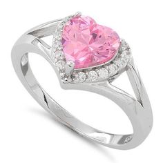 Top of ring height: 9.1mm

Top of ring width: 9.1mm

Band width: 5.6mm

Shank width: 1.7mm


Stone material: pink & clear cubic zirconia

Center stone size: 7mm x 7mm

Stone shape: heart shape (center) & round

Center stone carat weight: 1.13 ct.

Total number of CZ stones: 17

Stone setting: Prong setting


Metal: 925 sterling silver

Plating: rhodium plated

Finish: high polish Heart Halo Ring, Pink Heart Rings, Pink Heart Necklace, Silver Heart Ring, Cz Ring, Pink Ring, Pretty Rings, Ring Promise, Ring Engagement