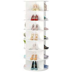 a tall white shelf with several pairs of shoes on top of it and one pair of high heels in the bottom