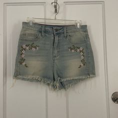 Embroidered Shorts With A Raw Hem. Never Worn. High Waist Denim Bottoms With Floral Embroidery, High Rise Denim Bottoms With Floral Embroidery, High-rise Denim Bottoms With Floral Embroidery, Embroidered Light Wash Denim Jeans, Summer High Rise Jeans With Floral Embroidery, Summer Mid-rise Floral Embroidered Jeans, Spring Medium Wash Bottoms With Floral Embroidery, High Rise Floral Embroidered Bottoms For Spring, Casual High Rise Bottoms With Floral Embroidery