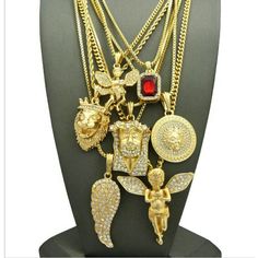 14k Gold Plated 7 Chain Combo Iced Out Ruby Wing Medusa King Leo 24" 30" Gold Cuban Link Necklace For Formal Occasions, Gold 14k Charm Necklaces, 14k Gold Charm Necklaces With Chain, Fine Jewelry Cuban Link With Adjustable Chain, 14k Gold Charm Necklace With Chain, Fine Jewelry With Adjustable Cuban Link Chain, Gold Plated Cuban Link Chain Jewelry, 14k Gold Cuban Link Jewelry With Adjustable Chain, Gold-plated Cuban Link Chain Jewelry