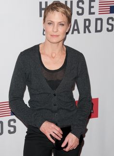 the woman is posing on the red carpet at the house of cards awards ceremony in new york city