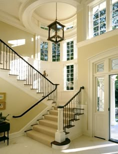 the stairs in this house are white and black