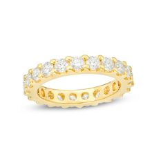 A scintillating symbol of your commitment, this diamond eternity band is a sparkling and romantic look. Crafted in 14K gold, this shimmering all-around design features 1/15 ct. diamonds boasting a color rank of H and clarity of Si2. Radiant with 2 cts. t.w. of diamonds and a brilliant buffed luster, this comfort-fit eternity band celebrates your love. Enchanted Disney Fine Jewelry, Disney Fine Jewelry, Diamond Eternity Band, Eternity Wedding Band, Eternity Band Diamond, Shop Engagement Rings, Diamond Eternity, Gold Wedding Band, Eternity Band