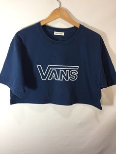 Vans Crop T-Shirt Trendy Crew Neck Top With Front Print, Trendy Crew Neck Tops With Logo Print, Logo Print Crew Neck Top For Streetwear, Crew Neck Logo Print Top For Streetwear, Basic Blue Tops With Screen Print, Basic Short Sleeve Tops With Logo Print, 90s Crew Neck Top With Relaxed Fit, 90s Style Relaxed Fit Tops With Text Print, Basic Logo Print Tops For Summer