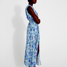 Floral Dress Blue Floral V-neck Dress For Daywear, Blue V-neck Maxi Dress For Daywear, Light Blue Maxi Sundress For Spring, Chic Blue Floral Midi Dress, Chic Blue Midi Floral Dress, Blue Floral Midi Dress For Spring, Spring Daytime Maxi Dress, Daytime Sleeveless Maxi Dress With Floral Print, Blue Floral Midi-length Dress For Spring