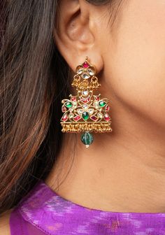 Experience exceptional craftsmanship with our Ahmedabadi Kundan stone in green, White  and red with Birds design jadau Earrings featuring a single green dangling bead. Crafted with precision and elegance, these Earrings are the epitome of timeless beauty. Note: This jewelry has no precious metals or stones. Note: Some of the pics are close up shots to show detail and may make the product appear larger. Please refer to the measurements picture for better perspective on size. Festive Matching Earrings For Navratri, Celebration Jewelry With Matching Earrings For Navratri, Green Temple Jewelry For Festive Occasions, Festive Kundan Jewelry With Latkans, Festive Temple Jewelry Earrings With Tilla, Green Jewelry For Wedding And Navratri, Traditional Kundan Jewelry With Matching Earrings, Kundan Jewelry With Matching Earrings For Diwali, Traditional Drop Earrings With Latkans