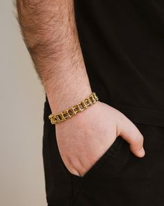 Upgrade your wrist game with our exclusive Bolt Chain Watch Band Bracelet. This sophisticated men's bracelet features a watch band chain that adds a touch of luxury and style to your outfit. Elevate your look with the perfect balance of elegance and functionality. Materials: 14K gold plated stainless steel, rhodium plated stainless steel, ion plated stainless steel Features: Measures 7" length, 0.45" width, Lead & Nickel free, foldover single channel clasp