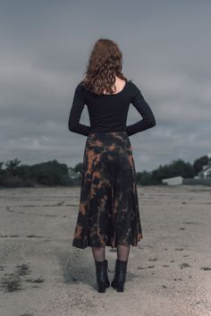 This tulip shaped midi skirt is made with 12 panels and a wide high waisted waist band. It has beautiful flow and movement and feels super soft and comfortable. Part of our tie-dye collection, it is a great piece for all seasons but especially for fall as it will give you serious witchy vibes. Made with our super soft buttery bamboo stretch jersey.