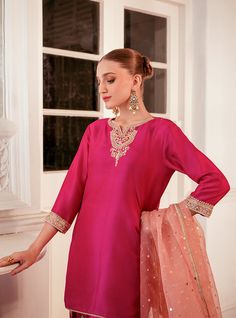 Elevate your style with this intriguing and elegant hot pink silhouette. The ensemble features exquisite embroidered details on the neckline, sleeves and bottom with shade of pink, adding a touch of sophistication and charm. Paired with a contrast organza dupatta, this outfit effortlessly enhances your look, making it perfect for any occasion where you want to make a stylish and memorable impression. Shirt: Raw SilkPants: Raw SilkDupatta: Organza Pink Silhouette, Zainab Chottani, Dressy Clothes, Shade Of Pink, Organza Dupatta, How To Iron Clothes, Embroidered Details, Silk Dupatta, Silk Pants