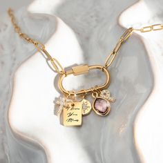 This elegant and adjustable Gold Charm Necklace is the perfect personalized gift for women. The sleek and trendy design allows for easy customization by adding various charms of your choice, making it a unique piece of jewelry that fits any style. Whether you want to celebrate a special moment with a zodiac charm or create a DIY design for a loved one, this necklace offers endless possibilities. Crafted with a high-quality gold-plated chain, it's an excellent choice for birthdays, holidays, and Custom Engraved Necklace, Personalized Charm Necklace, Custom Charm Necklaces, Lock Necklace, Mixed Metal Jewelry, Zodiac Gifts, Custom Charms, Best Gifts For Her, Gold Charm Necklace