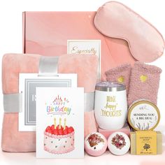 a pink birthday gift box filled with personal care items