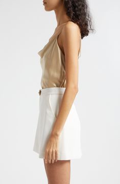 The soft glow of smooth silk satin enhances the after-dark romance of this delicate cowl-neck cami. 23" center front length (size Medium) Cowl neck Adjustable straps 100% silk Dry clean Imported Elegant Cowl Neck Slip Dress For Summer, Formal Silk Sleeveless Camisole, Chic Slip Dress With Satin Finish And Cowl Back, Formal Satin Sleeveless Camisole, Formal Satin Tank Top For Summer, Chic Silk Camisole With Spaghetti Straps, Chic Silk Slip Dress With Cowl Back, Feminine Silk Tank Top For Party, Elegant Silk Tank Top For Evening