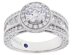 Vanna K™ for Bella Luce® white diamond simulant 3.71ctw round and square, Platineve™ Ring. Measures approximately 0.88"L x 0.44"W and is not sizeable. Each Vanna K™ design has a signature label that features a lab created sapphire. The diamond equivalent weight is 2.24ctw. Gia Certified White Cubic Zirconia Halo Ring, Diamond Simulant, Buying Jewelry, A Signature, White Diamond, Cubic Zirconia, Sapphire, Lab, Engagement Rings