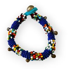 This colorful, beaded bracelet can be worn on its own or layered with some of your other favorite pieces. Vibrant comes to mind as it adds a pop of color to any outfit with its tribal inspired patterns. Some accessory options: tasseled Thai tribal necklace, geometrically inspired wood bead necklace, simple double pearl necklace, or the double strand necklace with geometric details Details: Beaded bracelet with a push button clasp. Clasp is either a small bell or charm. Size: length of beaded por Traditional Adjustable Beaded Bracelets With Colorful Beads, Traditional Adjustable Beaded Bracelets With Wooden Beads, Beaded Bangle Bracelet For Festivals, Traditional Bangle Bracelet With Tiny Beads, Traditional Adjustable Bracelets With Colorful Beads, Handmade Multicolor Beaded Bracelets For Festivals, Traditional Beaded Bracelets With Colorful Adjustable Beads, Handmade Beaded Bracelets With Round Beads For Festivals, Traditional Round Bead Bracelets For The Beach