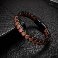 New Stylish Fashion Brown And Black Braided Leather Bracelet, Metal Magnetic Buckle Bracelet For Men. Perfect For Men Who Love Edgy And Trendy Accessories. High-Quality Material: Made Of Premium Leather And Metal, This Bracelet Is Durable And Comfortable To Wear. Easy To Wear: The Magnetic Buckle Makes It Easy To Put On And Take Off The Bracelet. Versatile: This Bracelet Is Suitable For Various Occasions, Such As Parties, Concerts, And Daily Wear. Great Gift Idea: This Bracelet Is A Perfect Gift Brown Leather Bracelet For Everyday Use, Brown Leather Braided Bracelet, Brown Braided Leather Bracelets, Brown Leather Bracelet With Wrist Strap For Everyday, Brown Leather Bracelet With Wrist Strap, Elegant Brown Leather Braided Bracelets, Elegant Brown Leather Braided Bracelet, Everyday Brown Bracelet, Casual Brown Leather Bracelet For Everyday Use