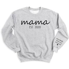 👩💕 Celebrate your journey as a mom with our Mama Est Since T-Shirt personalized with your kid's names! 🌟 Customize it for a special touch! 😍 Get yours now and wear your mom pride in style! Soft Style Solid color: 100% Airlume combed and ring-spun cotton Heather Colors: 52% Airlume Combed and ring-spun cotton, 48% polyester Heather Sport colors: 60/40 polyester/cotton 100% No Sweatshops & Eco-Friendly Production For different Mother's Day t-shirt designs, please take a look at our Mother's Day collection. https://www.greatwoodboutique.com/collections/mothers-day-tee-shirts Personalized Long Sleeve T-shirt For Mother's Day, Family Matching Sweatshirt With Name Print For Mother's Day, Cotton Tops For Mother's Day, Personalized Tops For Mother's Day, Personalized Mother's Day Cotton Top, Personalized Tops For Family Occasions On Mother's Day, Custom Text Long Sleeve T-shirt For Mother's Day, Family Long Sleeve T-shirt For Mother's Day, Long Sleeve T-shirt For Mother's Day