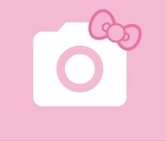 a pink hello kitty wallpaper with a camera