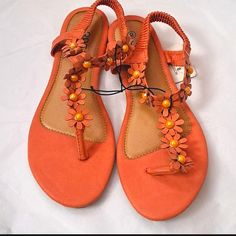 385 Fifth Coral/Orange Sandals With Flower Design, Size 8. Adorable! New Has Tag But Tags Ripped. Orange Flat Sandals For Spring, Adjustable Orange Sandals For Summer, Orange Flat Summer Sandals, Orange Sandals For Spring Beach Outings, Orange Sandals For Beach And Spring, Orange Sandals For Beach In Spring, Casual Orange Sandals For Spring, Coral Sandals, Orange Sandals