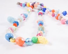 Whimsical Adjustable Beaded Necklace With Colorful Beads, Whimsical Adjustable Multicolor Beaded Necklaces, Adjustable Multicolor Whimsical Beaded Necklaces, Adjustable Multicolor Whimsical Beaded Necklace, Flower-shaped Colorful Beads Necklace For Gift, Elegant Flower-shaped Beaded Necklaces With Colorful Beads, Adjustable Flower-shaped Beaded Necklaces With Colorful Beads, Elegant Flower-shaped Necklace With Colorful Beads, Multicolor Flower-shaped Beaded Necklaces