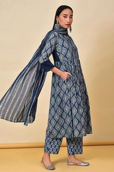 Indigo anarkali with geometric print and back embroidered bodice. Paired with dupatta and printed pyjama pant.
Component: 3
Pattern: Printed
Type Of Work: Geometric
Neckline: Mandarin 
Sleeve Type: Long Sleeves
Fabric: Cotton
Color: Blue
Other Details: 
Side pockets
Back embroidered bodice
Printed pyjama pant
Occasion: Puja - Aza Fashions Indigo Anarkali Traditional Wear For Navratri, Indigo Anarkali For Navratri, Indigo Anarkali Dupatta With Zari Work, Festive Indigo Anarkali Set With Dupatta, Indigo Dupatta With Zari Work, Designer Anarkali Kurta In Indigo, Indigo Anarkali Traditional Wear For Festivals, Indigo Anarkali Set For Diwali, Indigo Salwar Kameez With Dupatta For Navratri