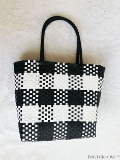 BagForLove - Versatile Plaid Square Tote Bag: Perfect for Casual Outings, Beach Vacations, and Shopping Product Description Color Black Type Straw Bag Strap Type Double Handle Pattern Type Plaid Features High-capacity Closure Type No-closure Composition 100% Polyvinyl Chloride Material PE Size Chart INCH CM Handle Height 7.1 inch Handle Height 18 cm Details Pictures Similar Products h2 { text-align: center; } /* æ¢è¡ */ li{ white-space: normal; word-break: break-all; word-wrap: break-word; } .red-box { width: 100%; display: flex; flex-direction: row; flex-wrap: wrap; justify-content: center; } .red-box > div { width: 190px; height: 250px; margin: 10px; } .red-box > div > a > img { width: 190px; height: 250px; } .size-box { width: 100%; margin: auto; white-space: nowrap; } .table { border Black Handheld Bags For Vacation, Black Handheld Bag For Vacation, Black Handheld Vacation Bags, Black Bucket Straw Bag For Vacation, White Square Bag For Vacation, Casual Black Bucket Beach Bag, White Square Vacation Bag, Large Capacity Black Straw Beach Bag, Large Capacity Black Straw Bag For Travel