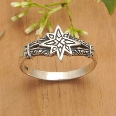 The spectacular star that crowns this sterling silver band ring is the key to its captivating allure. From casual occasions to formal gatherings, this impressive design presented by Bali's Putu Putri is destined to elevate your style with its exquisite oxidized finish, infusing your look with an irresistible blend of sophistication and charm. Handmade Silver Rings, Medieval Rings, Unique Silver Rings, Star Motif, Vintage Silver Rings, Silver Eye, Sterling Silver Rings Bands, Earring Crafts, Silver Band Ring