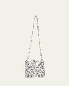 Paco Rabanne "1969" shoulder bag in allover disc brass hardware     Adjustable shoulder strap    Open top    Unlined     Approx. 16"H x 6.3"W x 3.9"D    Imported Evening Crossbody Shoulder Bag With Silver-tone Hardware, Evening Shoulder Bag With Palladium Hardware, Silver-tone Hardware Evening Shoulder Bag, Evening Crossbody Bag With Silver-tone Hardware, Silver Rectangular Shoulder Bag With Gold-tone Hardware, Silver Shoulder Bag With Gold-tone Hardware For Party, Designer Shoulder Bag With Palladium Hardware For Party, Crossbody Evening Bag With Metal Hardware, Evening Crossbody Bag With Metal Hardware