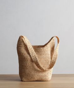 Raffia Crossbody Bag Natural OS This textured bag is perfectly packable and made to fit just about anything that's needed for all your summer outings. Crochet raffia bag. Made in China. | Jenni Kayne Raffia Crossbody Bag Straw Cross Body Bag, Raffia Crossbody Bag, Versatile Natural Hobo Tote Bag, Versatile Natural Color Hobo Bag For Everyday Use, Versatile Summer Straw Bag With Removable Pouch, Versatile Natural Hobo Bag For Everyday, Versatile Everyday Natural Hobo Bag, Versatile Natural Shoulder Bag For Everyday, Versatile Natural Color Pouch Bag