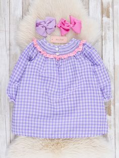 Get your little one ready for spooky season with our Purple Gingham Embroidered Ghosts Ruffle Dress! This playful dress features a fun purple gingham print with a pop of pink ruffle trim. And don't forget the embroidered ghosts that add a touch of whimsy to this quirky dress. Perfect for any Halloween party or just a day of play, this dress will have your little one looking boo-tiful! Shop the sister set! Fits true to size. 100% Cotton Accessories sold separately. Suggest bow color #53 & #58 Imp Quirky Dress, Cotton Accessories, Purple Gingham, Boo Tiful, Pink Ruffle, Gingham Print, Spooky Season, Ruffle Trim, Ruffle Dress