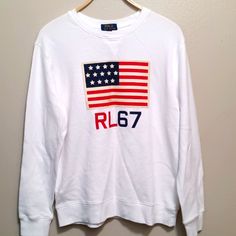 Brand New With Tags. It Is A Size Xl(16-18) Which Is The White Long Sleeve T-shirt With American Flag Print, Casual Long Sleeve T-shirt With Flag Print, Casual White Sweatshirt With American Flag Print, Sporty White Tops With American Flag Print, Cotton Crew Neck Sweatshirt With Flag Print, Casual White Tops With American Flag Print, White Crew Neck Top With Flag Print, White Crew Cotton Tops, Casual White Flag Print Top