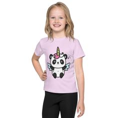 Get a t-shirt for your kids that has it all--colorful design that looks great, and a fit that allows the kiddos to participate in all of their favorite activities and be comfy the whole time. The ultimate kids tee. * 95% polyester, 5% elastane (fabric composition may vary by 1%) * Fabric weight: 6.19 oz/yd² (210 g/m weight may vary by 5% * Premium knit mid-weight jersey * Four-way stretch fabric that stretches and recovers on the cross and lengthwise grains * Regular fit * Crew neck * Blank product components in the US and Mexico sourced from the US * Blank product components in the EU sourced from Lithuania This product is made especially for you as soon as you place an order, which is why it takes us a bit longer to deliver it to you. Making products on demand instead of in bulk helps re Playful Cartoon Print Crew Neck T-shirt, Playful Crew Neck T-shirt With Cartoon Print, Playful Cotton T-shirt With Unicorn Print, Fun Unicorn Print Short Sleeve T-shirt, Fun Short Sleeve T-shirt With Unicorn Print, Cute White T-shirt With Unicorn Print, Cute Short Sleeve Tops With Unicorn Print, Playful Unicorn Print Crew Neck Top, Fun Cotton T-shirt With Unicorn Print