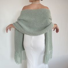 Wedding sage green shawl This versatile sage green wrap piece not only complements any outfit but also provides warmth and protection from the chilly weather throughout fall, winter, and spring. These cover up's make an excellent bridesmaid gift. Fuzzy and warm yarn. it is not itchy at all. My proucts are handmade. MATERİAL: 10% mohair, 10% wool, 80% premium acrylic-Polyamid, COLOR:SAGE GREEN  (PALE MİNT)  AS SHOWN MEASUREMENTS: (Average) Length: 67'' (170 CM) Width:20'' (50 CM) (without fringes Winter Wedding Bridesmaid Shawl, Winter Shawl Bridesmaid, Wedding Shawls And Wraps Western, Bridesmaid Shawl Fall Wraps, Winter Wedding Themes Scarves & Shawls, Green Winter Bridesmaid Dresses With Cover Up, Green Dress White Shawl, Blanket Scarf Bridesmaid Winter Weddings, Luxury Green Shawl-style Scarf