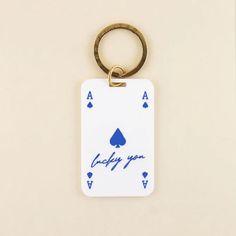 Lucky You Keychain in white acrylic with blue details and solid brass hardware | Shop Freshwater Keychain Charms Aesthetic, Best Friends Keychains, Keychain Acrylic Design, Bag Keychain Aesthetic, Car Keychain Aesthetic, Car Keys Keychain Ideas, Ceramic Keychain, Keychain Valentine, Brass Keychain