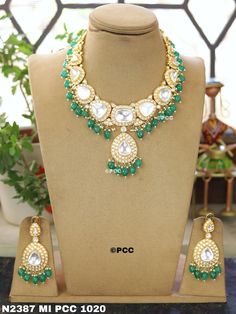 A Kundan Meena Polki bridal jewelry set can make a beautiful gift for occasions like weddings, anniversaries, birthdays, Mother's Day, and more. It's a thoughtful present for your wife, sister, or anyone celebrating a special event. The intricate craftsmanship and traditional design of Kundan Meena Polki jewelry make it a timeless and elegant choice. Whether it's for a Punjabi wedding or any other celebration, it's sure to be cherished.https://jewellerybypooja.etsy.com Green Wedding Anarkali Set With Meenakari, Green Meenakari Anarkali Set For Wedding, Wedding Green Meenakari Anarkali Set, Wedding Sets With Gota Work Chandbali Style, Traditional Hand Set Chandbali Sets, White Kundan Traditional Wear For Wedding, Bollywood Bridal Sets For Wedding And Eid, Kundan Sets For Eid Celebration, Wedding Anarkali Set With Meenakari For Eid