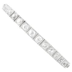 A stunning, fine and impressive antique Old cut 7.85 carat diamond and 18 karat white gold, palladium set bracelet; part of our diverse antique diamond bracelets collection. This stunning, fine and impressive antique diamond bracelet has been crafted in 18k white gold with a palladium setting. This impressive antique bracelet is composed with nineteen Old European round cut diamonds, totalling 7.85cts, individually pavé set to millegrain decorated square links. The bracelet secures with a push f Bracelets Collection, Set Bracelet, Antique Bracelets, White Gold Bracelet, Antique Diamond, Bracelet Collection, Diamond Bracelets, Antique Jewellery, Round Cut Diamond