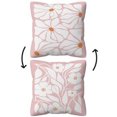 two pink and white pillows with flowers on them