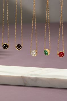 This Mini Smiley Face Necklace features a petite pendant with an adorable smiley face, attached to an adjustable chain (16" + 3" extender). Express your fun and playful personality with this cute accessory. Smiley Face Necklace, Face Necklace, Smiley Face, Smiley, Chain, Pendant, Red