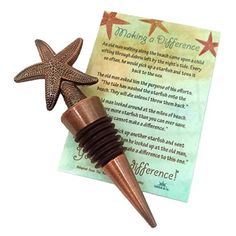 a starfish bottle stopper with a message on it